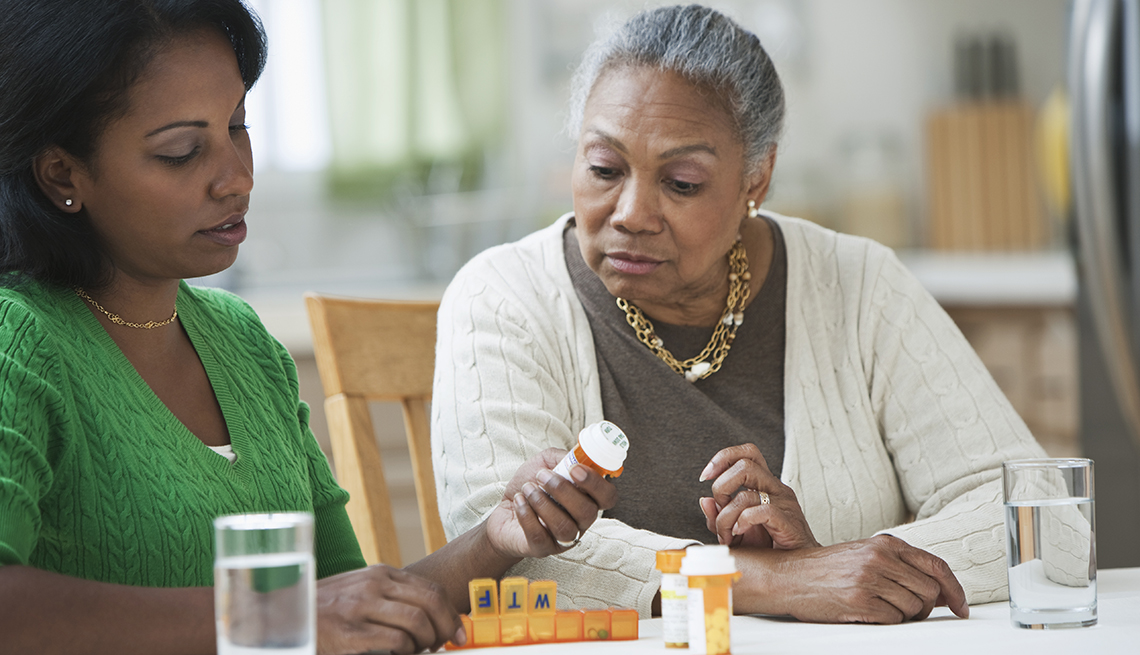 nurse practitioner assisting and explaining medicines to patient under medication management in baltimore, md